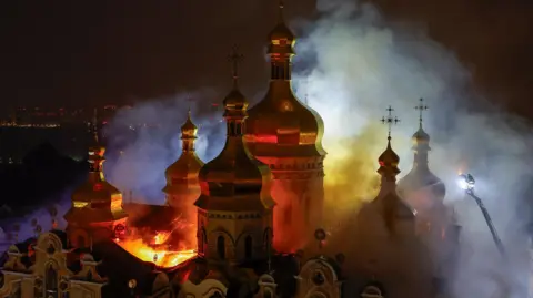 Russian Strikes Kill Nine and Set Kyiv's Dormition Cathedral Ablaze