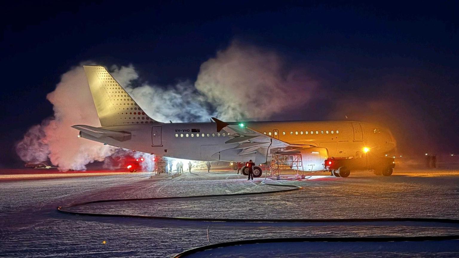 Australian crew lands in Antarctic darkness to evacuate stranded US scientist
