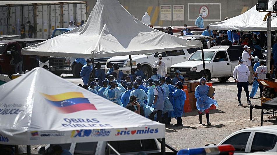 In the Heat of Despair: Venezuelan Families Drag Through Makeshift Morgue to Identify Lost Loved Ones